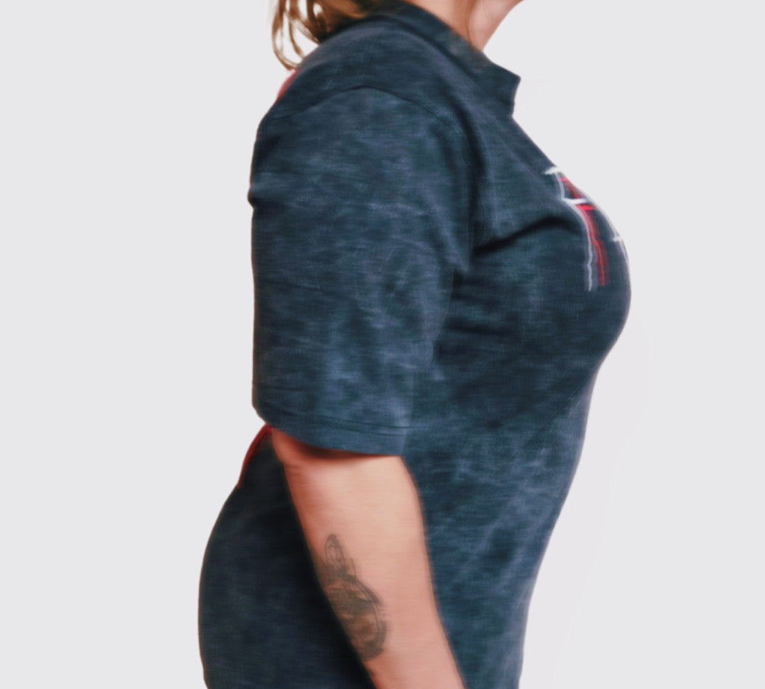 Oversized acid-washed black heavyweight tee with red graphic and drop shoulder seams.